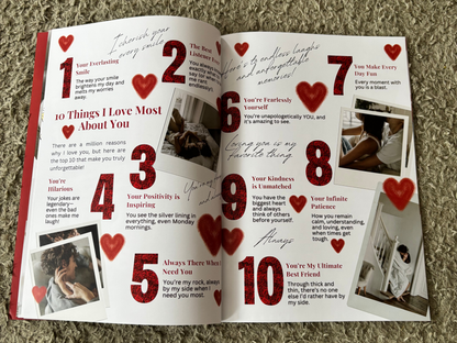 An open printed booklet or card spread laid on a textured beige carpet. The pages are white with large red numbers 1 through 10, scattered red hearts, handwritten script, and small black-and-white photos.