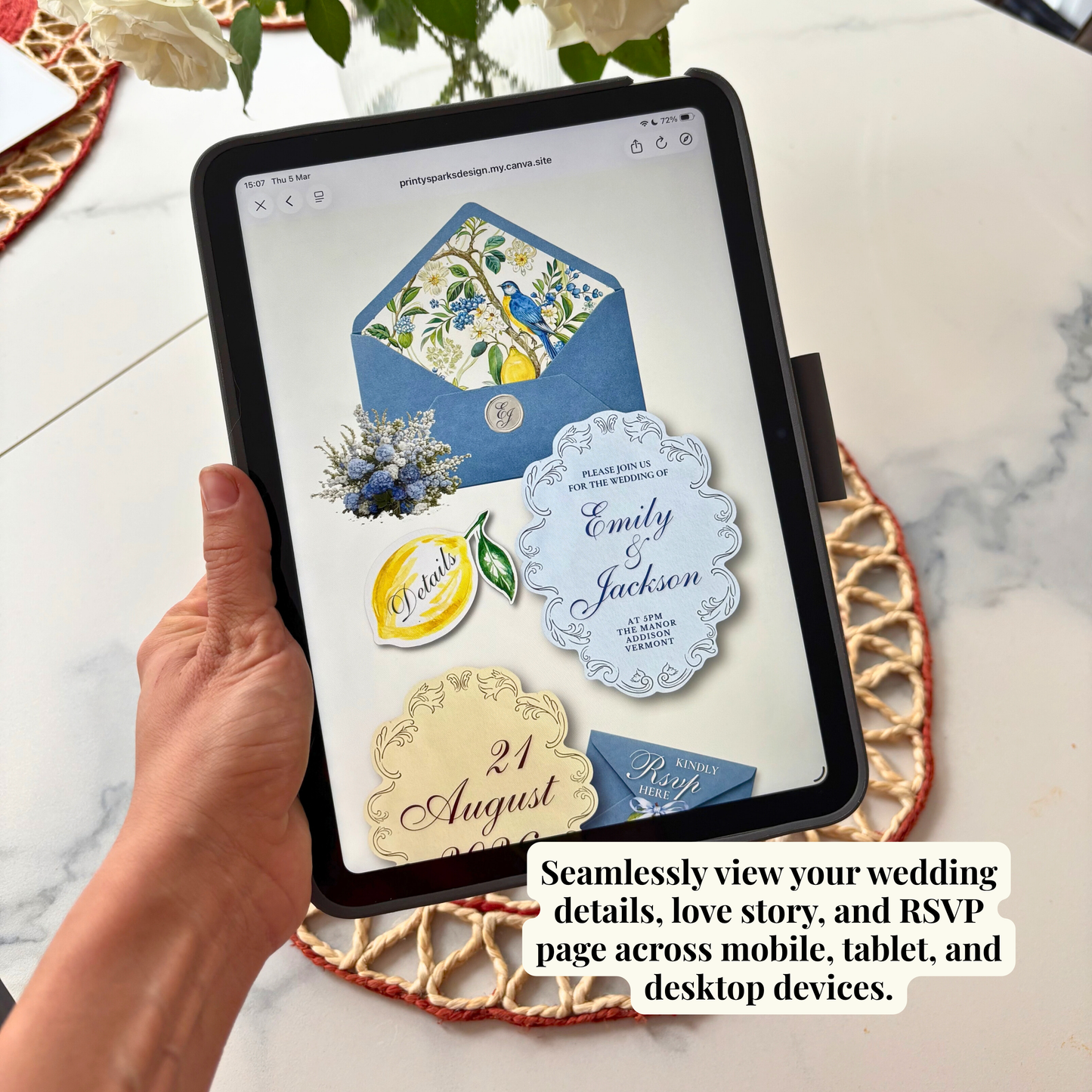 A hand holds a tablet showing a wedding invitation design on a marble surface with decorative placemats and flowers. The tablet screen displays floral stationery elements, and a text overlay reads, 'Seamlessly view your wedding details, love story, and RSVP page across mobile, tablet, and desktop devices.